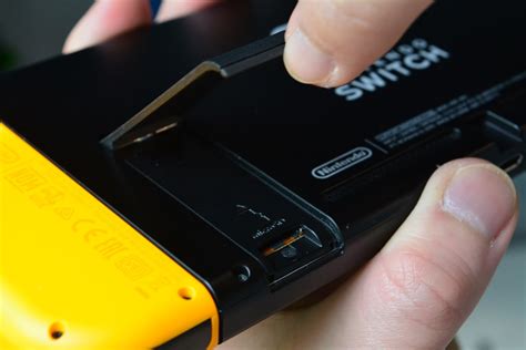 How to put an SD card in a Nintendo Switch - Android Authority