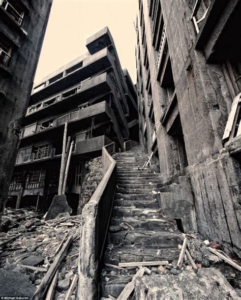 an old run down building with stairs leading up to the second floor and ...