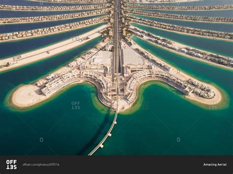 Aerial view of the Palm Jumeirah island in Dubai, U.A.E. stock photo - OFFSET