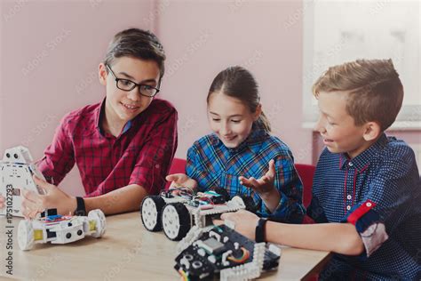 Stem education. Kids creating robots at school Stock Photo | Adobe Stock