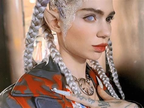 Grimes Announces Plans To Get Vampire Teeth, Elf Ears