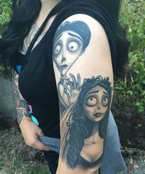 a woman with a tattoo on her arm