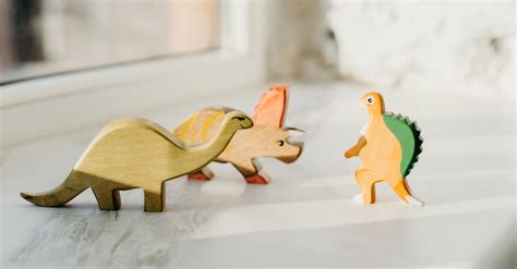 Brown and Green Wooden Animal Figurines · Free Stock Photo