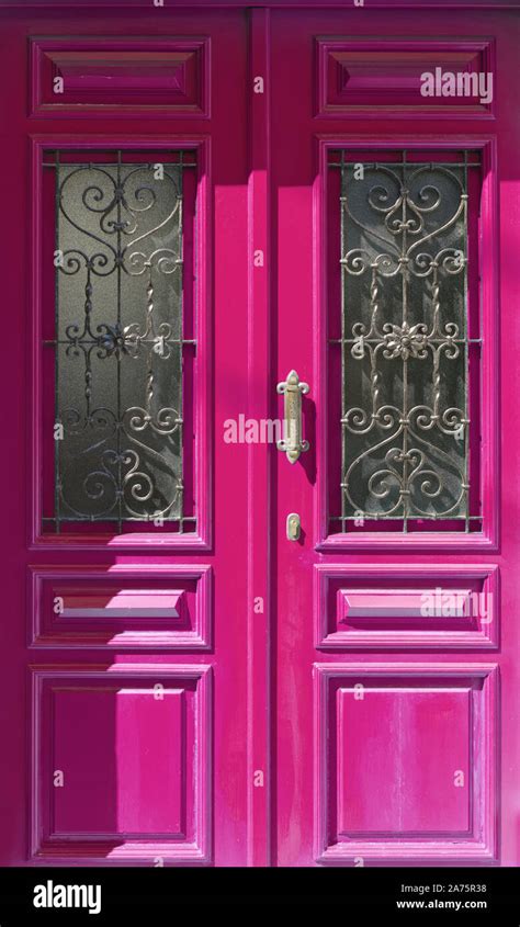 Wood door wrought iron hi-res stock photography and images - Alamy