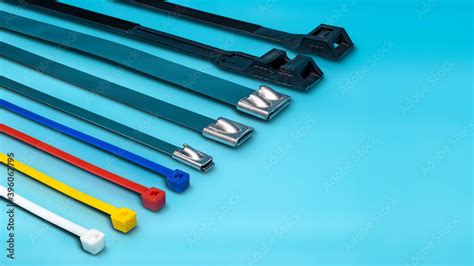 Various types of clamps for fastening electrical wires. Plastic and ...