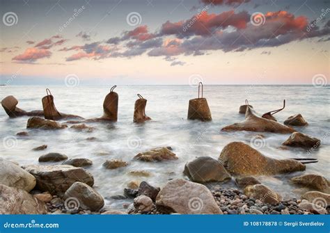 Massive Concrete Tetrapods Form a Breakwater with Soft Blur Sea Stock Photo - Image of beach ...