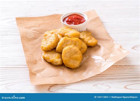 Chicken nuggets with sauce stock image. Image of nuggets - 145113841