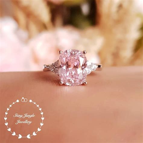 Pink diamond ring, 3 stone style engagement ring, 3 carats cushion cut fancy pink diamond ...