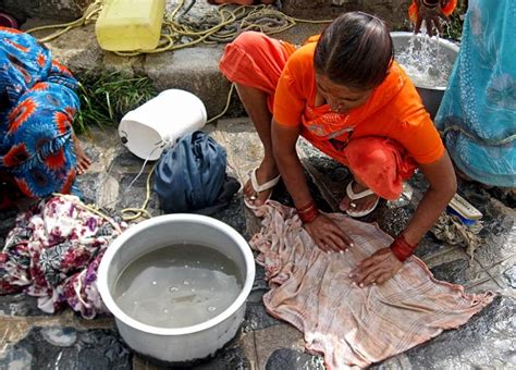 Stock Pictures: Washing clothes by hand