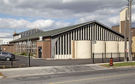 20201214. St Philip Neri Catholic Church (1959) with its four oddly placed barrel shapes out ...