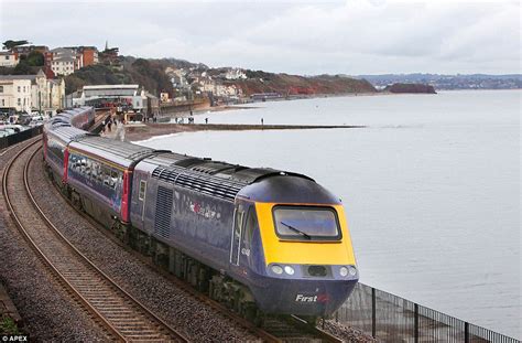 Dawlish railway line reopens after 'heroic' work by engineers | Daily Mail Online