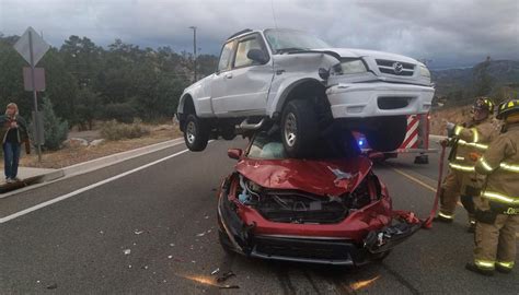 Pickup truck lands atop car in 'remarkable' Prescott, Arizona, crash