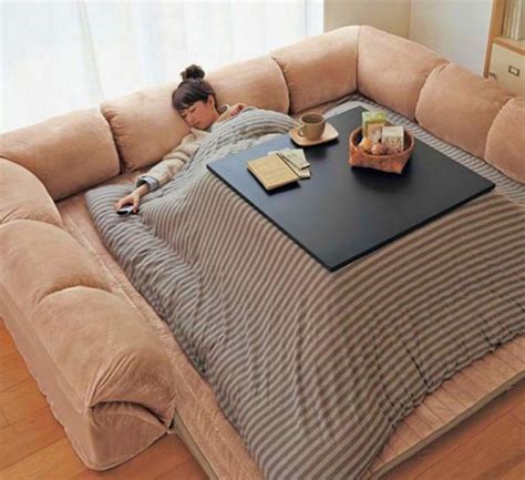 The Japanese Heated Kotatsu Table Has Everything You Need To Eat, Work And Sleep