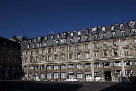 an old building with many windows and balconies