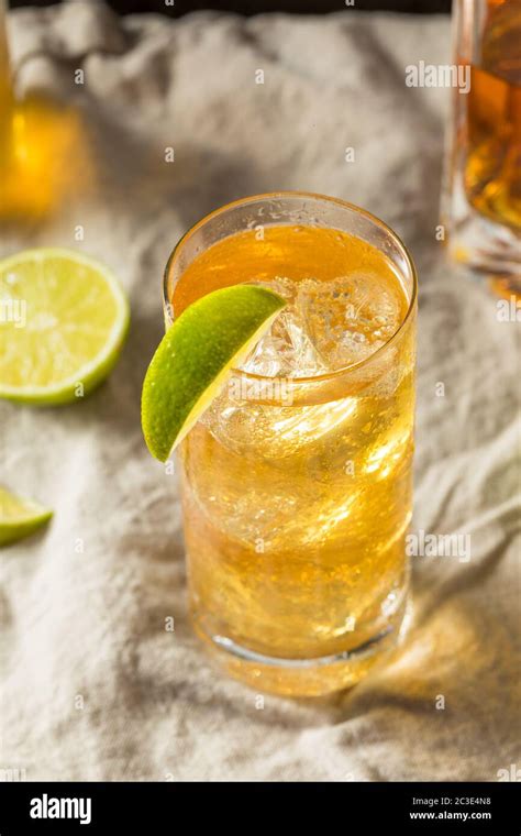 Boozy Whiskey Ginger Ale Cocktail with LIme Stock Photo - Alamy