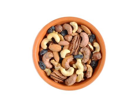 Nuts and Raisins in a Cup on a White Background Isolate Healthy Food Beneficial Trace Elements ...