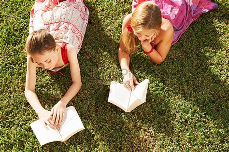 Girl Lying On The Grass And Reading A Book Picture And HD Photos | Free ...