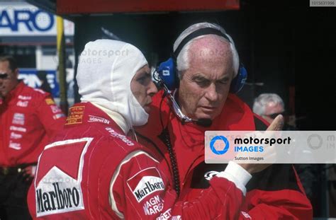 Tarso Marques (BRA) Tarso Marques talks to team owner Roger Penske ...