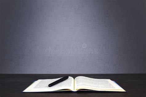 Open Bible. Holy Bible on the Table. Pen and Notepad. Stock Image ...