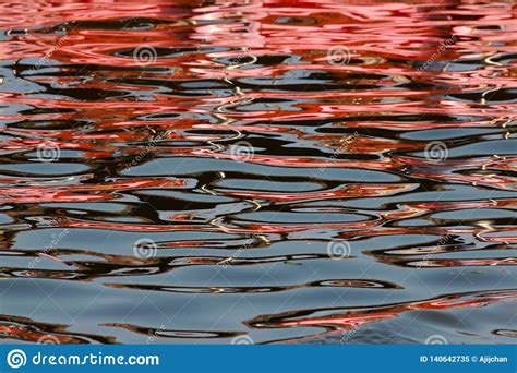 Abstract Reflections of Colours in Water Stock Image - Image of water, abstract: 140642735