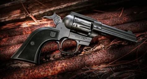 A cowboy-style revolver with interchangeable 9-shot cylinder: from ...