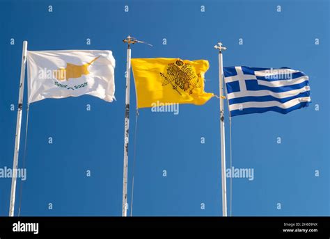 Three flags, flag of Cyprus, church of Cyprus flag and Greek flag ...