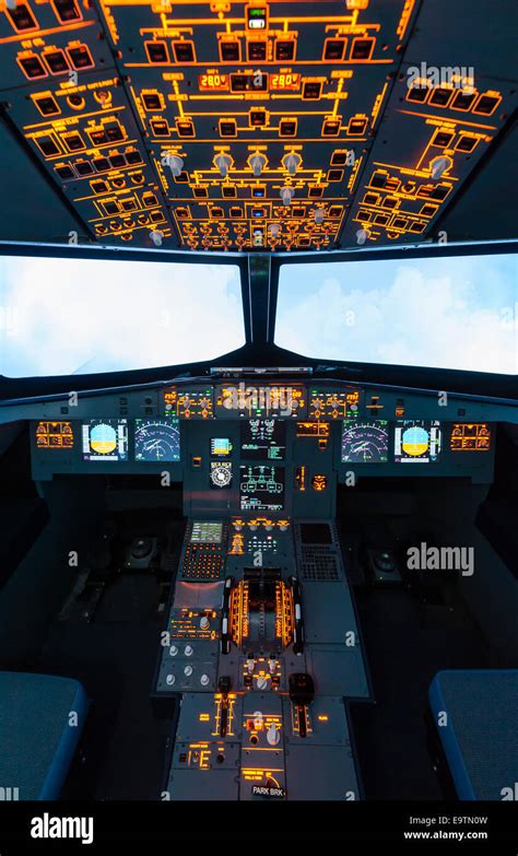 Cockpit of an Airbus A320 flight simulator that is used for training of professional airline ...