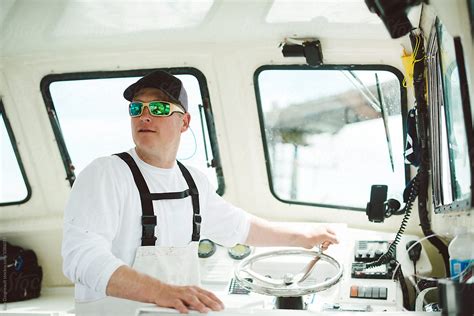 "Commercial Fishing Boat Captain" by Stocksy Contributor "Kate Ames ...