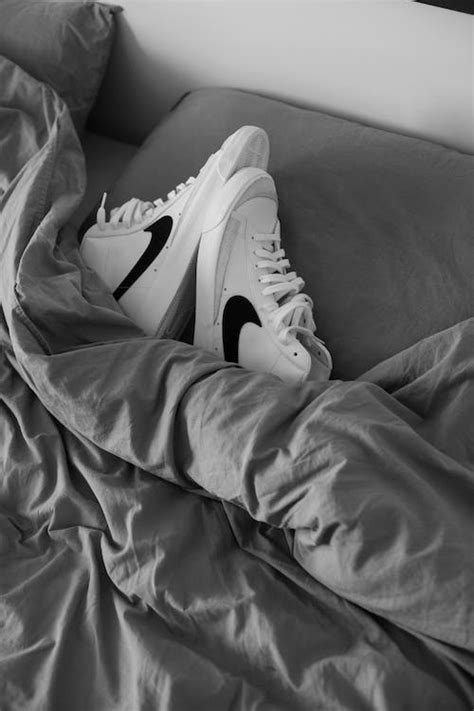 White Shoes on the Bed · Free Stock Photo