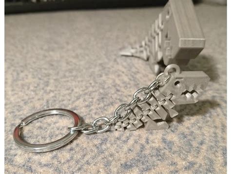 Flexi T-Rex Keychain Shared by rcmiddleton101 - MakerWorld