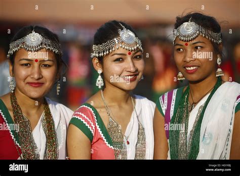 Kathmandu, Nepal. 14th Jan, 2017. Women from ethnic Tharu community clad in traditional attire ...