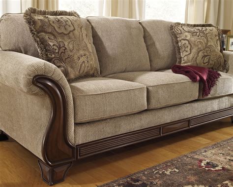 Ashley Signature Design Lanett 4490038 Sofa with Flared Arms & Exposed Wood Accents | Dunk ...