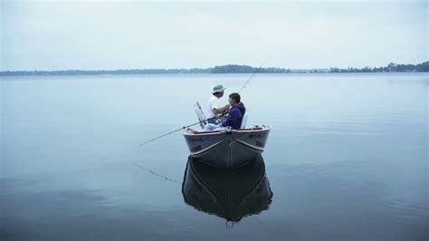 couple fishing in boat - YouTube