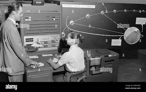 Human computer with IBM 704 in 1959 Stock Photo - Alamy