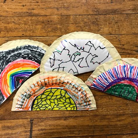 Tambourines or shakers!! Folded paper plate, filled with rice and popcorn kernels, and taped ...