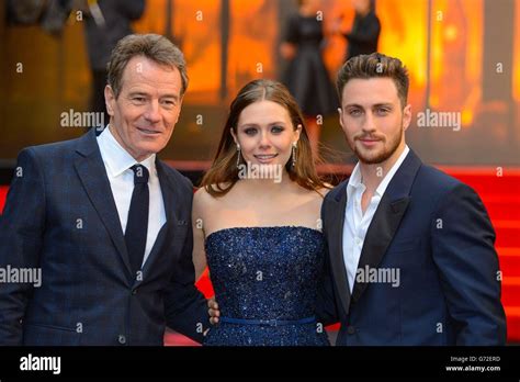 Bryan Cranston, Elizabeth Olsen and Aaron Taylor-Johnson arriving at the European premiere of ...