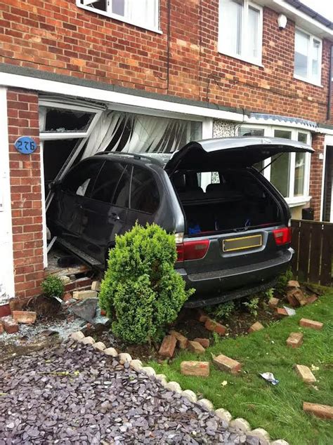 BMW car crashes into house in Ashington - Chronicle Live