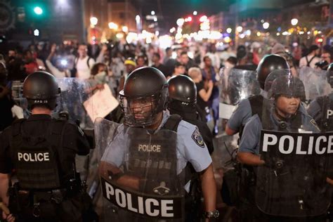 Protests over St Louis police shooting turn violent for third day