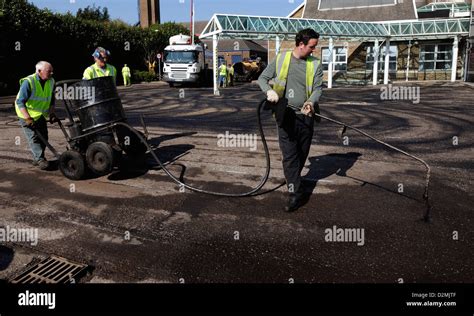 Tack Coat Stock Photos & Tack Coat Stock Images - Alamy