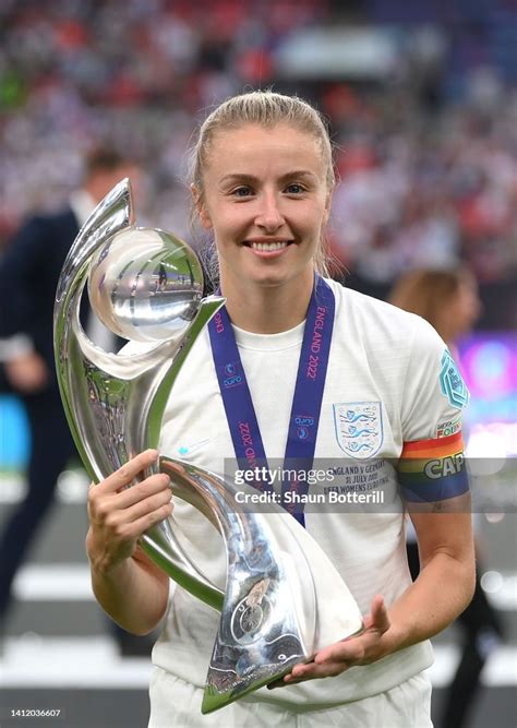 Leah Williamson of England lifts the UEFA Women's EURO 2022 Trophy ...