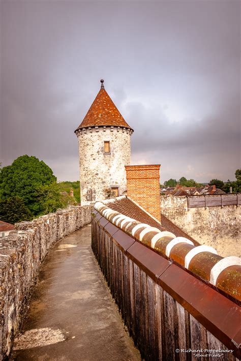 Medieval castle courtyard with towers and wall - Château d… | Flickr