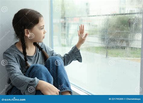 Sad Little Girl Near Window on Rainy Day Stock Image - Image of conflict, bullying: 221795305