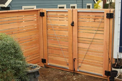 Double door gate | Horizontal wood fence with alternating picket sizes for an extra unique look ...