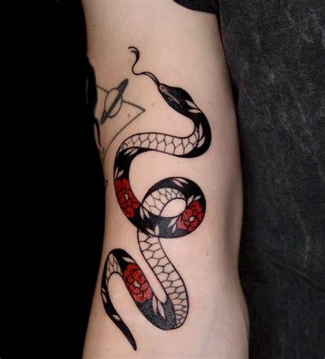 Black and red traditional snake tattoo | Traditional snake tattoo, Red ...