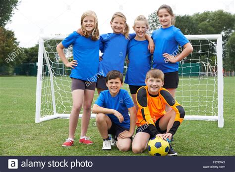 Boys And Girls In Elementary School Soccer Team Stock Photo - Alamy