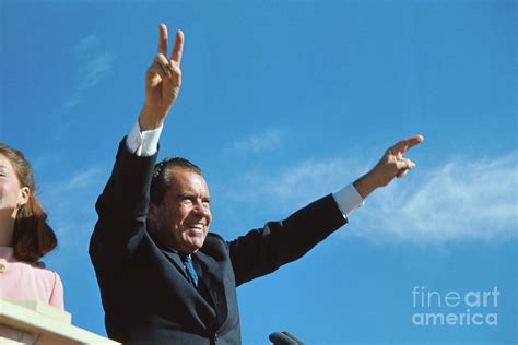 Richard Nixon Giving Victory Sign by Bettmann