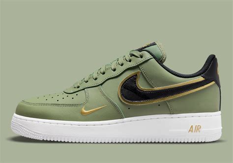 Nike Air Force 1 Green Gold Swoosh DA8481-300 | SneakerNews.com