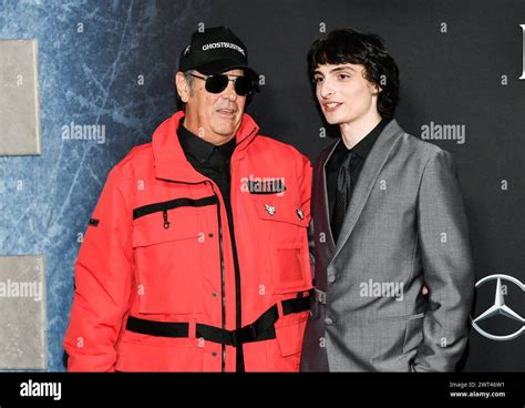 Dan Aykroyd, left, and Finn Wolfhard attend the premiere of ...