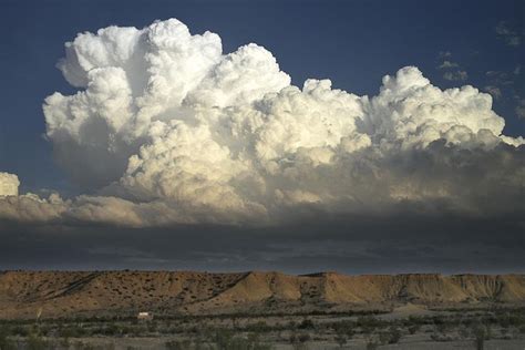 Massive cumulus formation Terlingua TX early May. Morphed into full blown anvil storm cloud ...