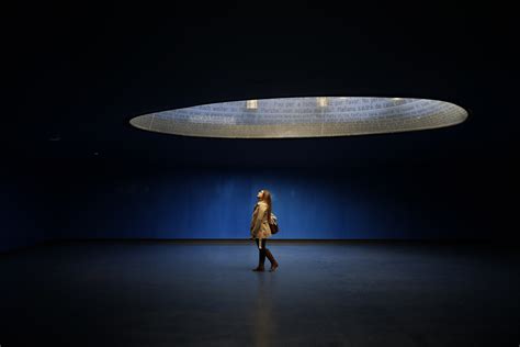 Woman visits the interior of the Madrid train bombing memorial at Atocha station, in Madrid